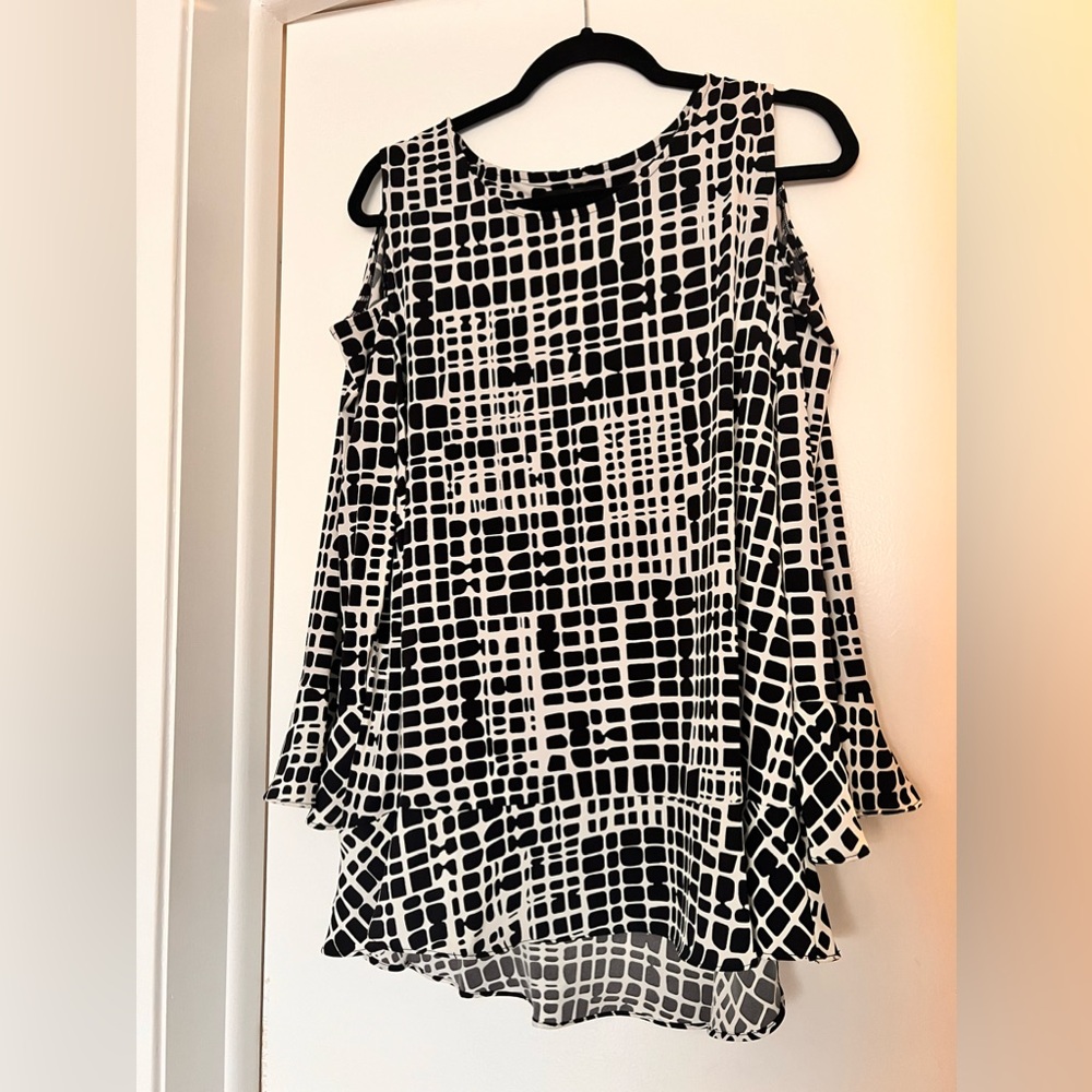 White and black checkered blouse